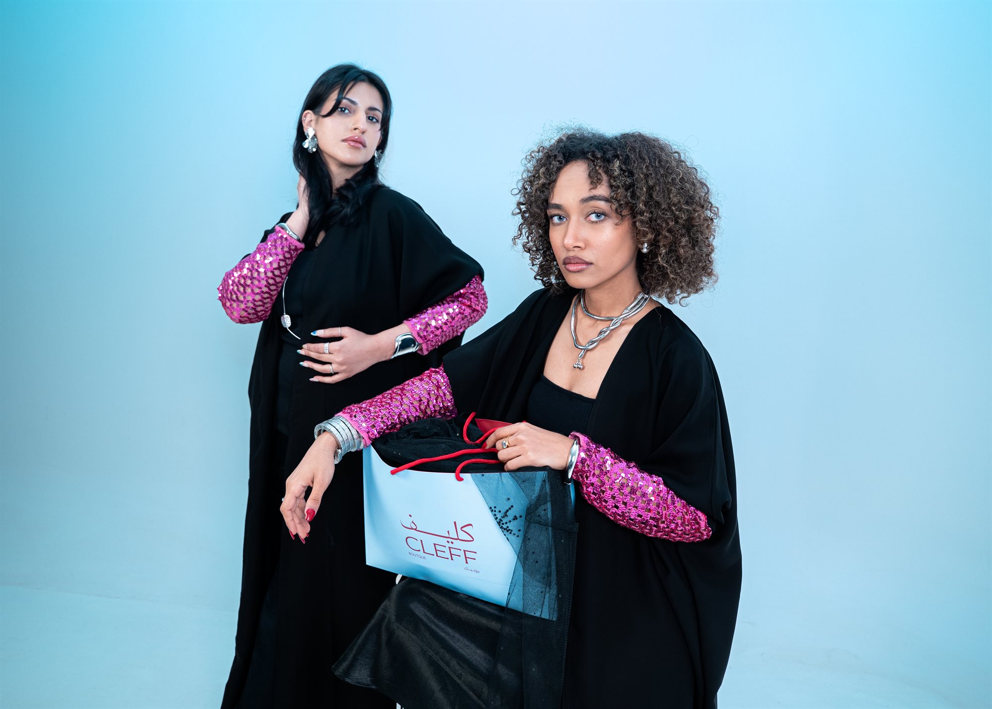 Cleff Boutique, pink sequin sleeves with the brand bag