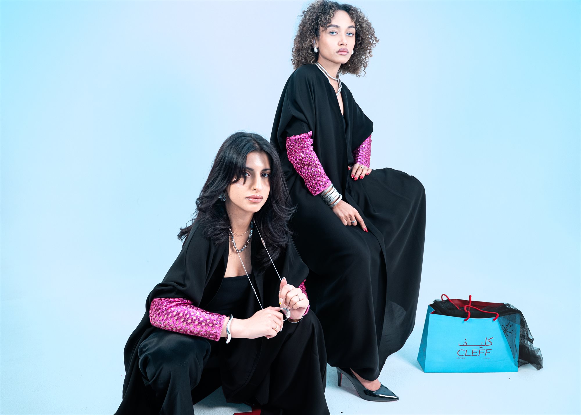 Cleff Boutique, seated composition with the bag