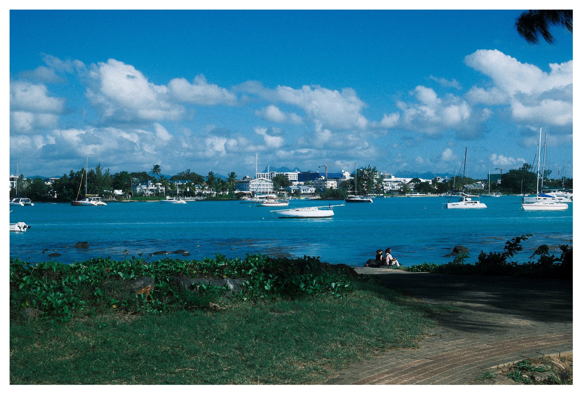 Mauritius, a wide view of the harbour under drifting clouds