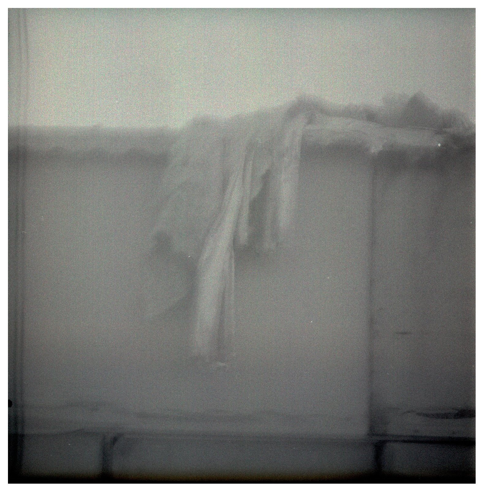 Pieces of a Familiar Place, fabric draped over the edge of a wall